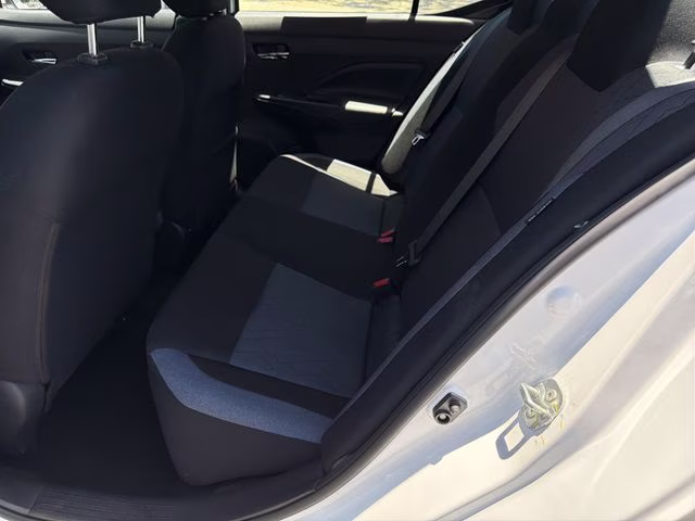 2025 Aspen White Tricoat Nissan Versa 1.6 SV FWD Sedan