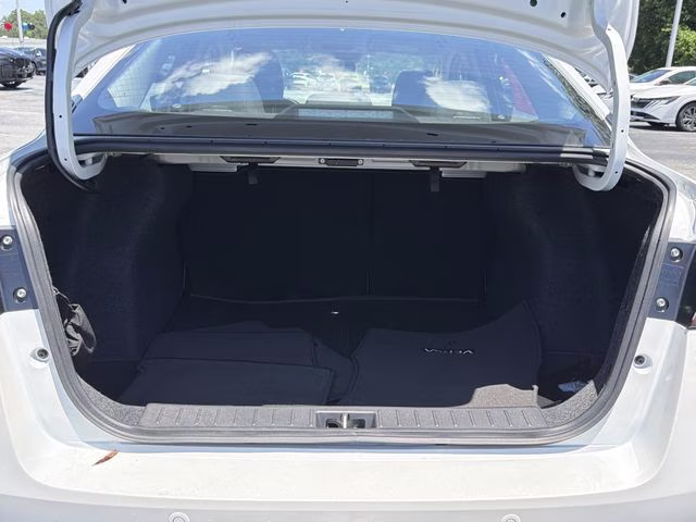 2025 Aspen White Tricoat Nissan Versa 1.6 SV FWD Sedan