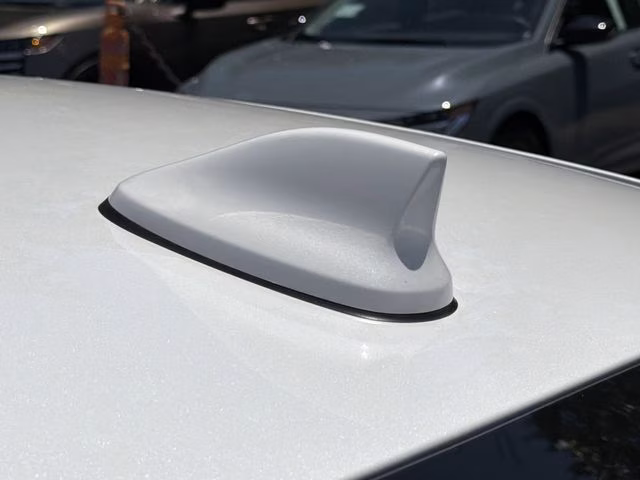 2025 Aspen White Tricoat Nissan Versa 1.6 SV FWD Sedan