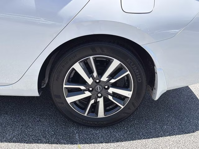 2025 Aspen White Tricoat Nissan Versa 1.6 SV FWD Sedan