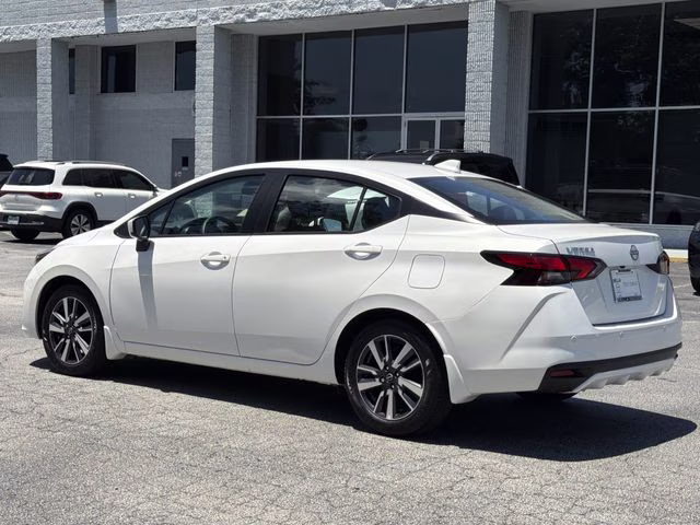 2025 Aspen White Tricoat Nissan Versa 1.6 SV FWD Sedan