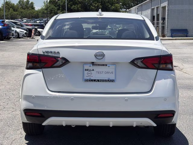 2025 Aspen White Tricoat Nissan Versa 1.6 SV FWD Sedan