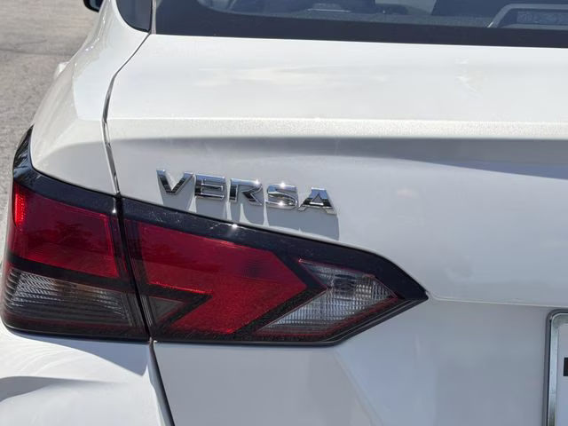 2025 Aspen White Tricoat Nissan Versa 1.6 SV FWD Sedan