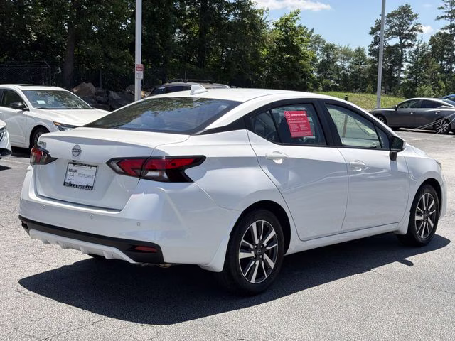 2025 Aspen White Tricoat Nissan Versa 1.6 SV FWD Sedan