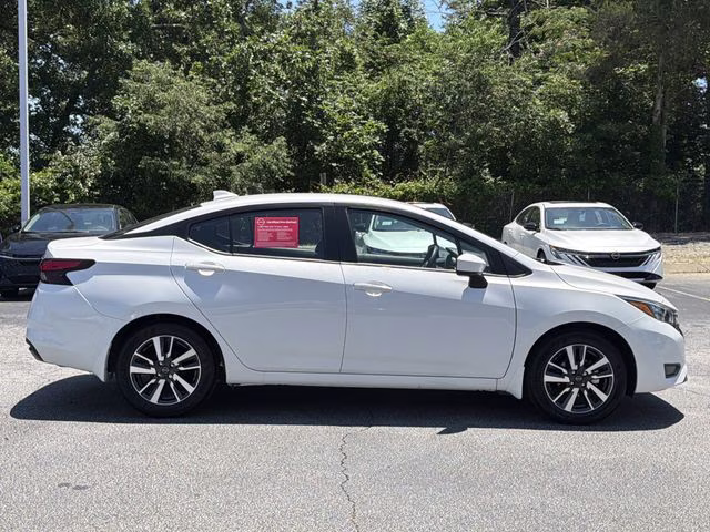 2025 Aspen White Tricoat Nissan Versa 1.6 SV FWD Sedan