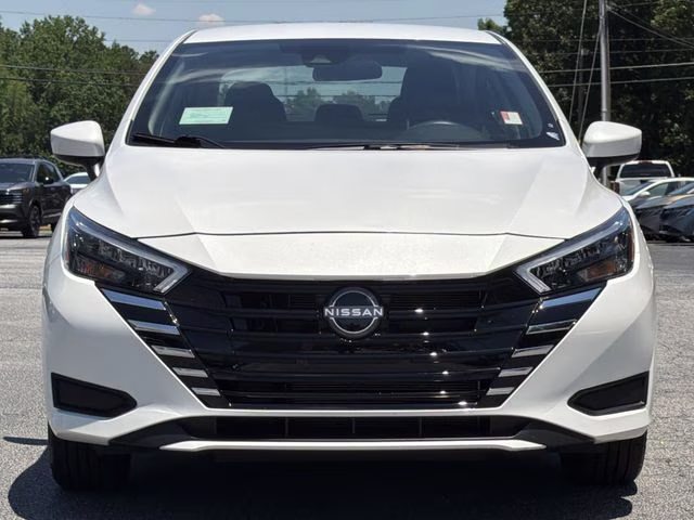2025 Aspen White Tricoat Nissan Versa 1.6 SV FWD Sedan