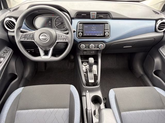 2025 Aspen White Tricoat Nissan Versa 1.6 SV FWD Sedan