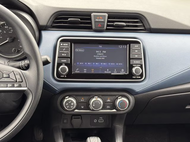 2025 Aspen White Tricoat Nissan Versa 1.6 SV FWD Sedan