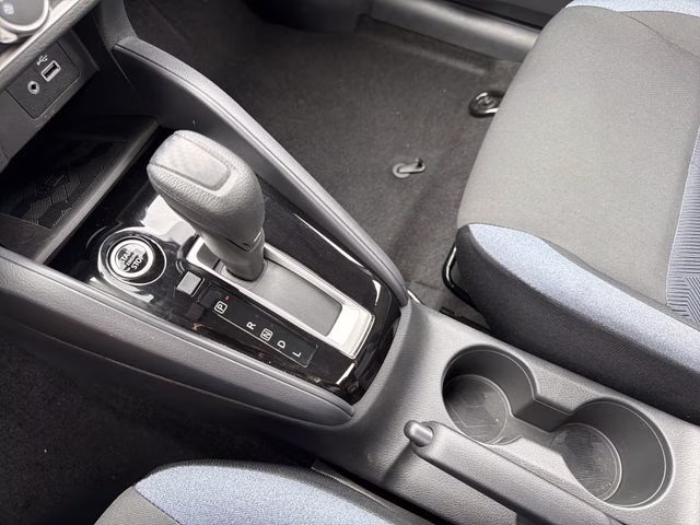 2025 Aspen White Tricoat Nissan Versa 1.6 SV FWD Sedan