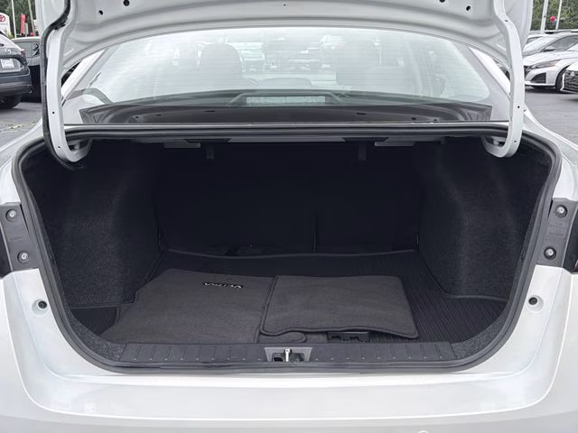 2025 Aspen White Tricoat Nissan Versa 1.6 SV FWD Sedan