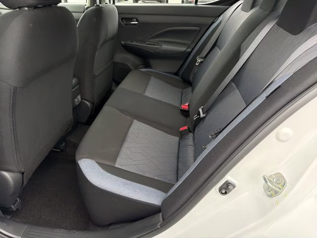 2025 Aspen White Tricoat Nissan Versa 1.6 SV FWD Sedan
