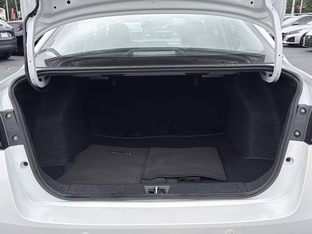 2025 Aspen White Tricoat Nissan Versa 1.6 SV FWD Sedan