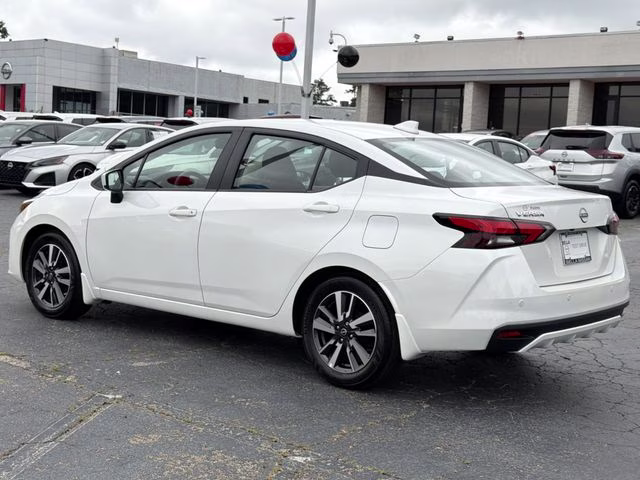 2025 Aspen White Tricoat Nissan Versa 1.6 SV FWD Sedan