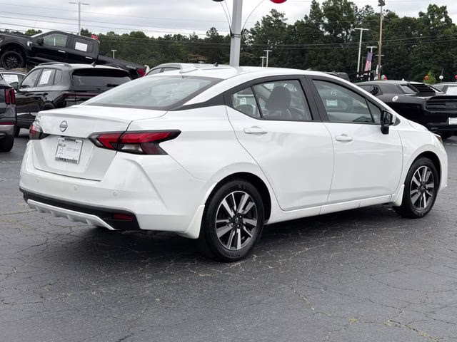 2025 Aspen White Tricoat Nissan Versa 1.6 SV FWD Sedan