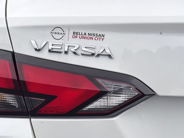 2025 Aspen White Tricoat Nissan Versa 1.6 SV FWD Sedan
