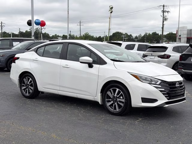 2025 Aspen White Tricoat Nissan Versa 1.6 SV FWD Sedan