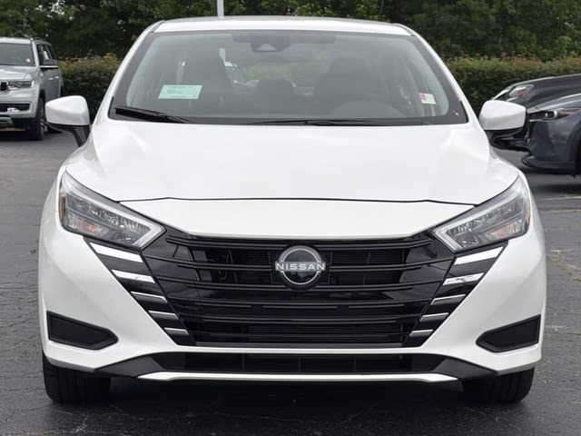 2025 Aspen White Tricoat Nissan Versa 1.6 SV FWD Sedan