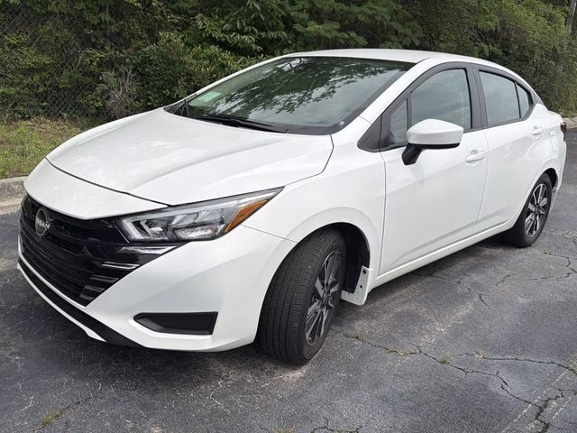 2025 Aspen White Tricoat Nissan Versa 1.6 SV FWD Sedan
