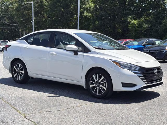 2025 Aspen White Tricoat Nissan Versa 1.6 SV FWD Sedan