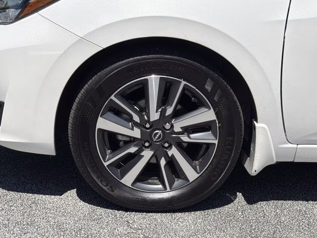 2025 Aspen White Tricoat Nissan Versa 1.6 SV FWD Sedan