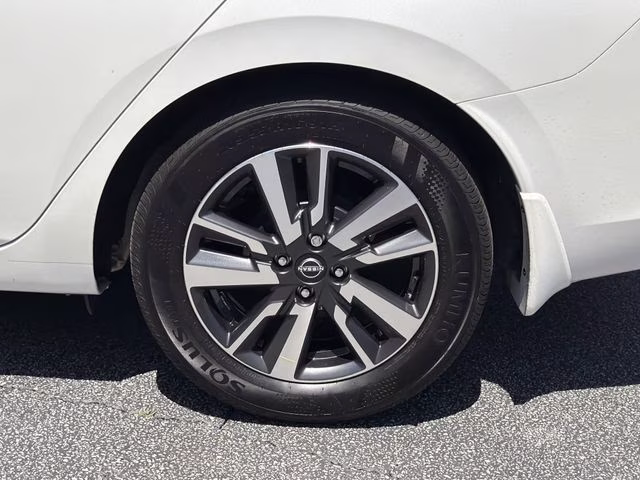 2025 Aspen White Tricoat Nissan Versa 1.6 SV FWD Sedan