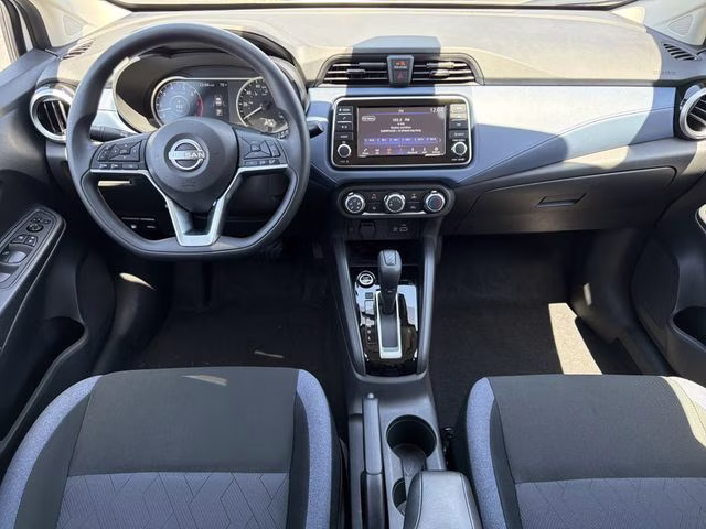2025 Aspen White Tricoat Nissan Versa 1.6 SV FWD Sedan