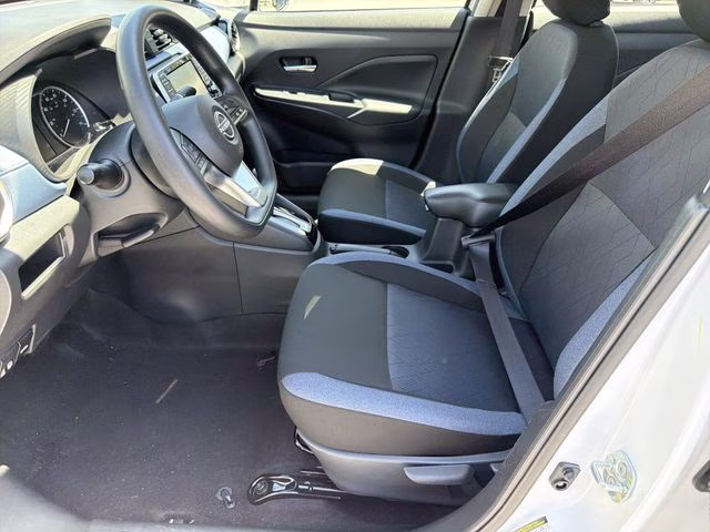 2025 Aspen White Tricoat Nissan Versa 1.6 SV FWD Sedan