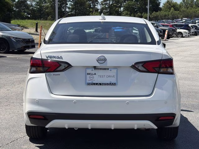 2025 Aspen White Tricoat Nissan Versa 1.6 SV FWD Sedan