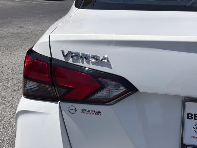 2025 Aspen White Tricoat Nissan Versa 1.6 SV FWD Sedan