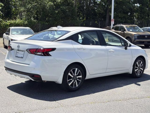 2025 Aspen White Tricoat Nissan Versa 1.6 SV FWD Sedan
