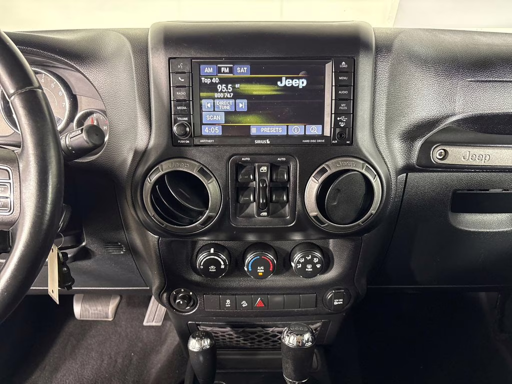 2016 Billet Silver Metallic Clearcoat Jeep Wrangler Unlimited Sport 4X4 SUV