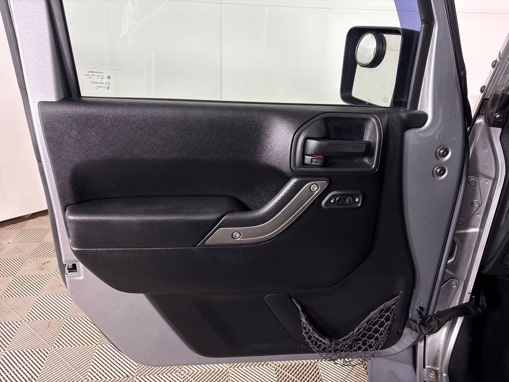 2016 Billet Silver Metallic Clearcoat Jeep Wrangler Unlimited Sport 4X4 SUV