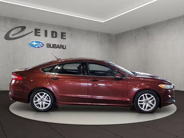 2015 Bronze Fire Metallic Tinted Clearcoat Ford Fusion SE FWD Sedan