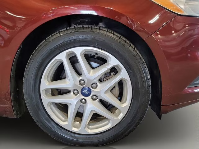 2015 Bronze Fire Metallic Tinted Clearcoat Ford Fusion SE FWD Sedan
