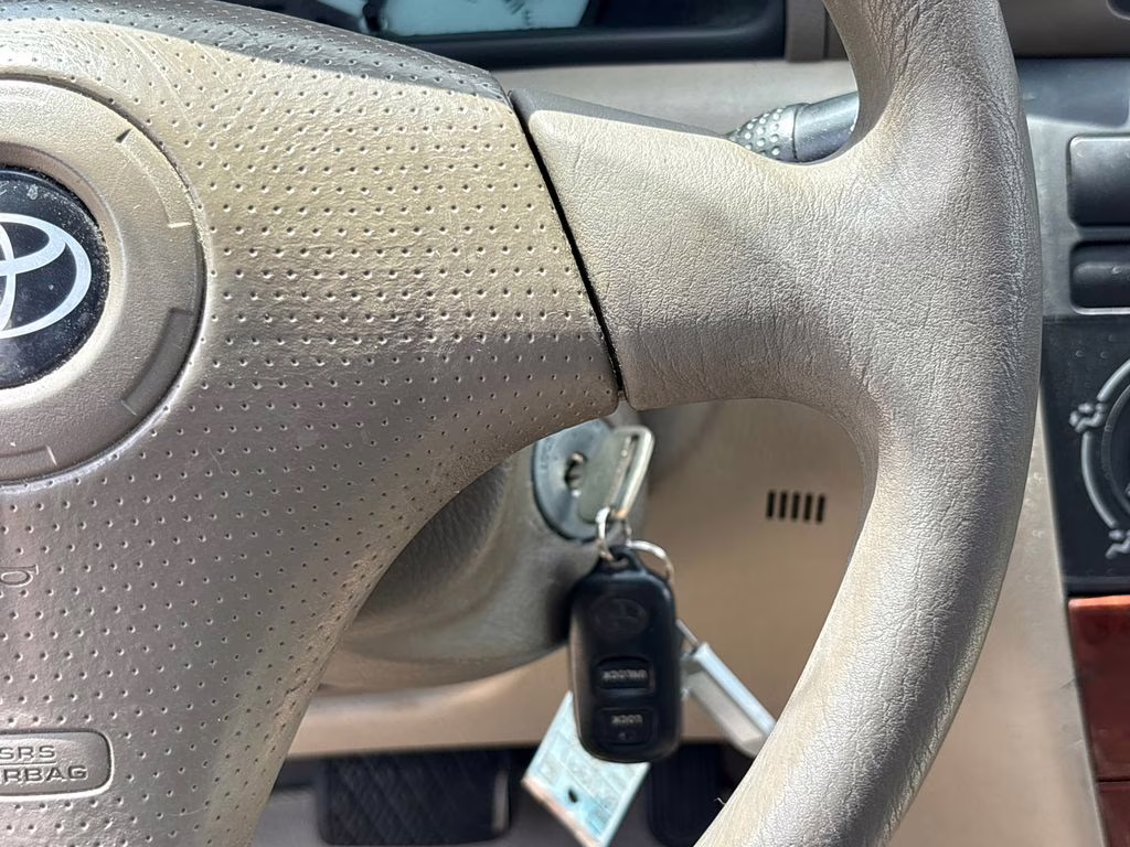 2004 Desert Sand Mica Toyota Corolla CE FWD Sedan