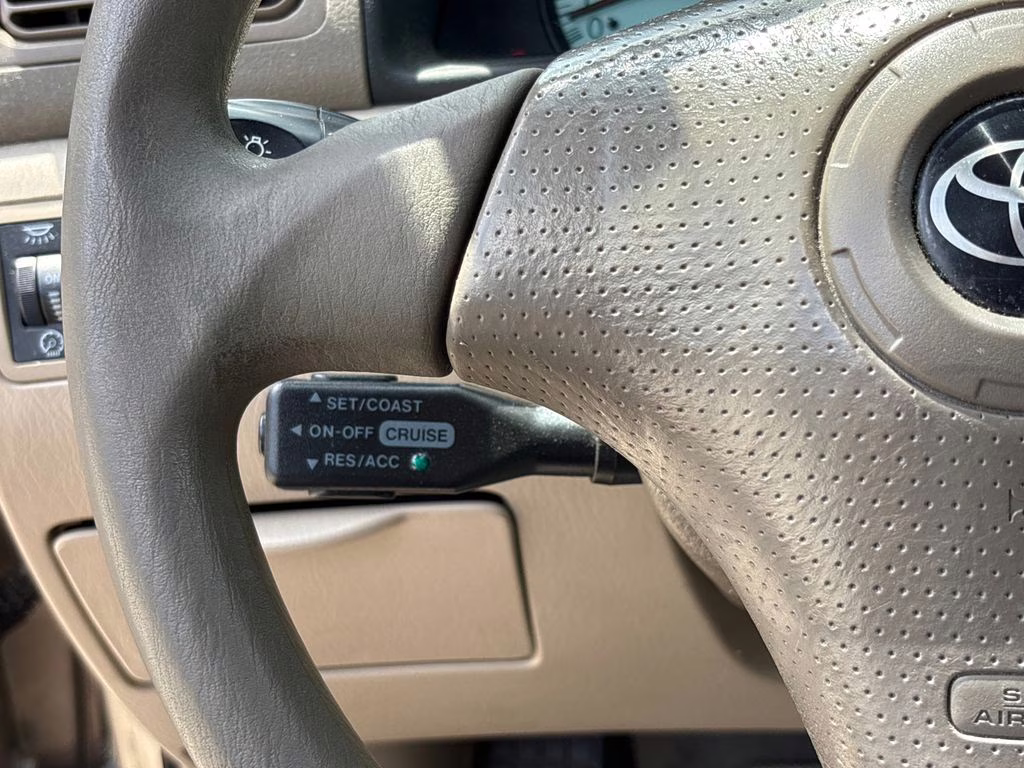 2004 Desert Sand Mica Toyota Corolla CE FWD Sedan