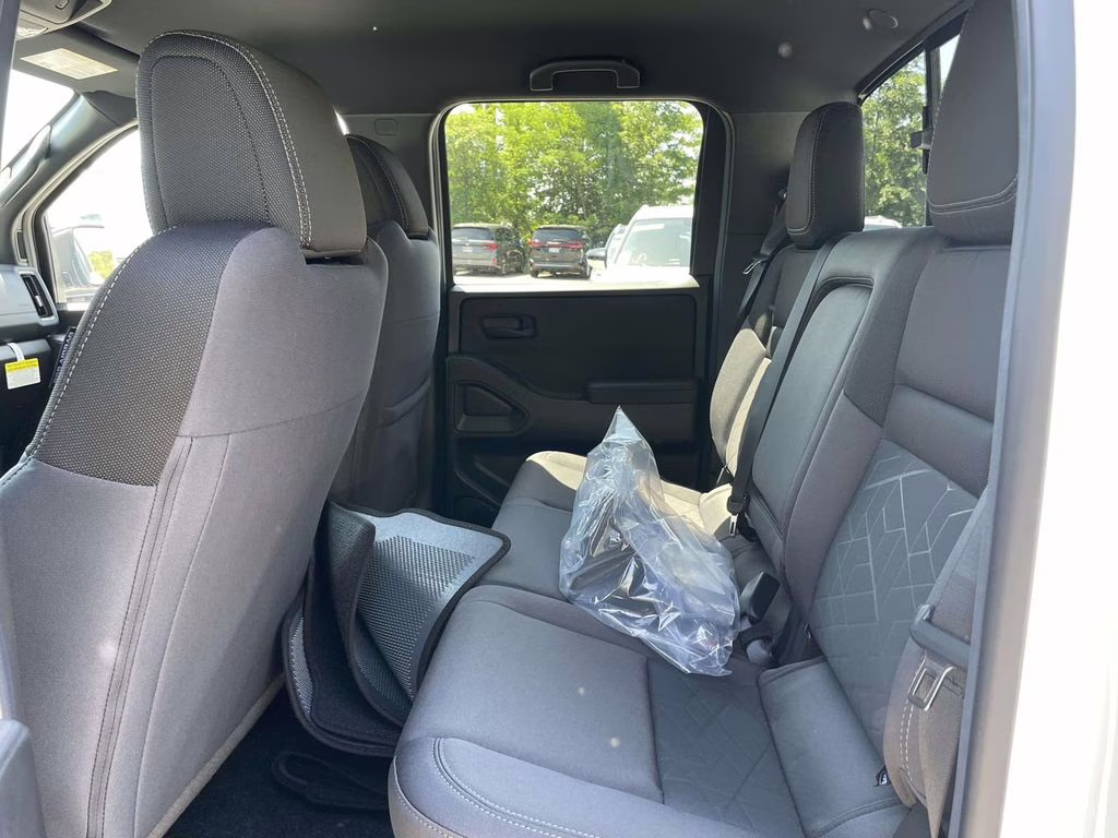 2026 Glacier White Nissan Frontier SV 4X4 Truck