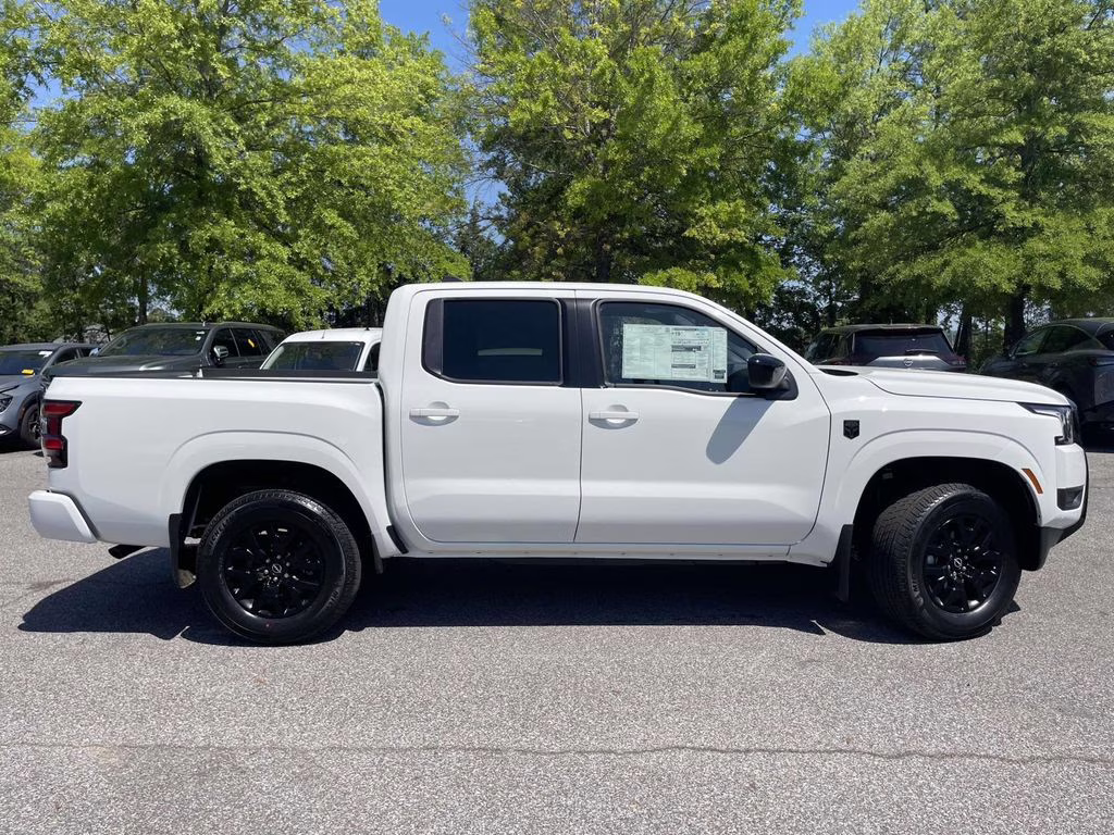 2026 Glacier White Nissan Frontier SV 4X4 Truck