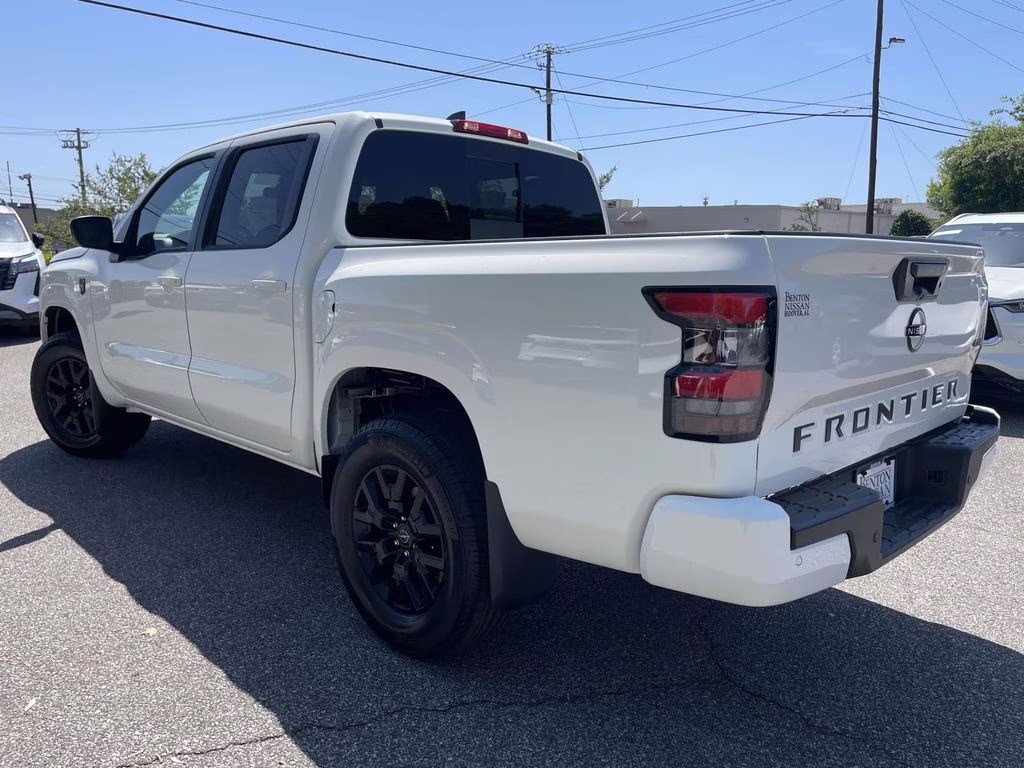 2026 Glacier White Nissan Frontier SV 4X4 Truck
