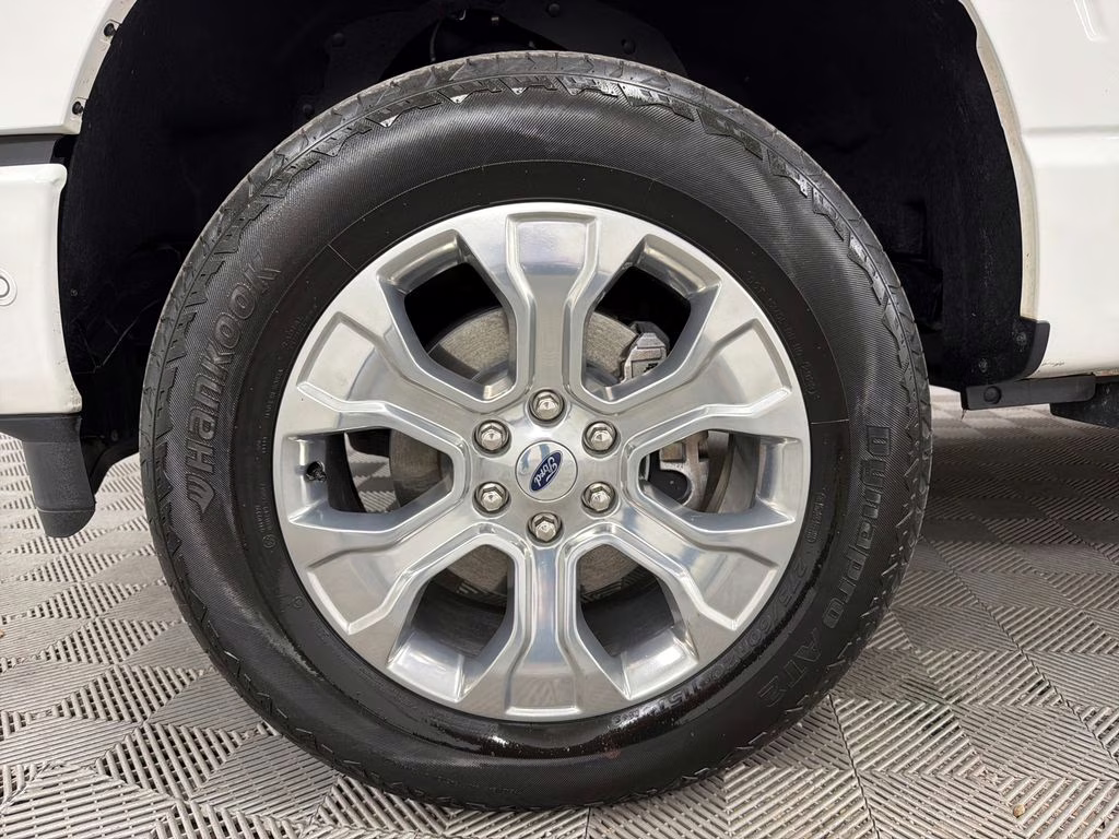 2023 Star White Metallic Tri-Coat Ford F-150 Platinum 4X4 Truck