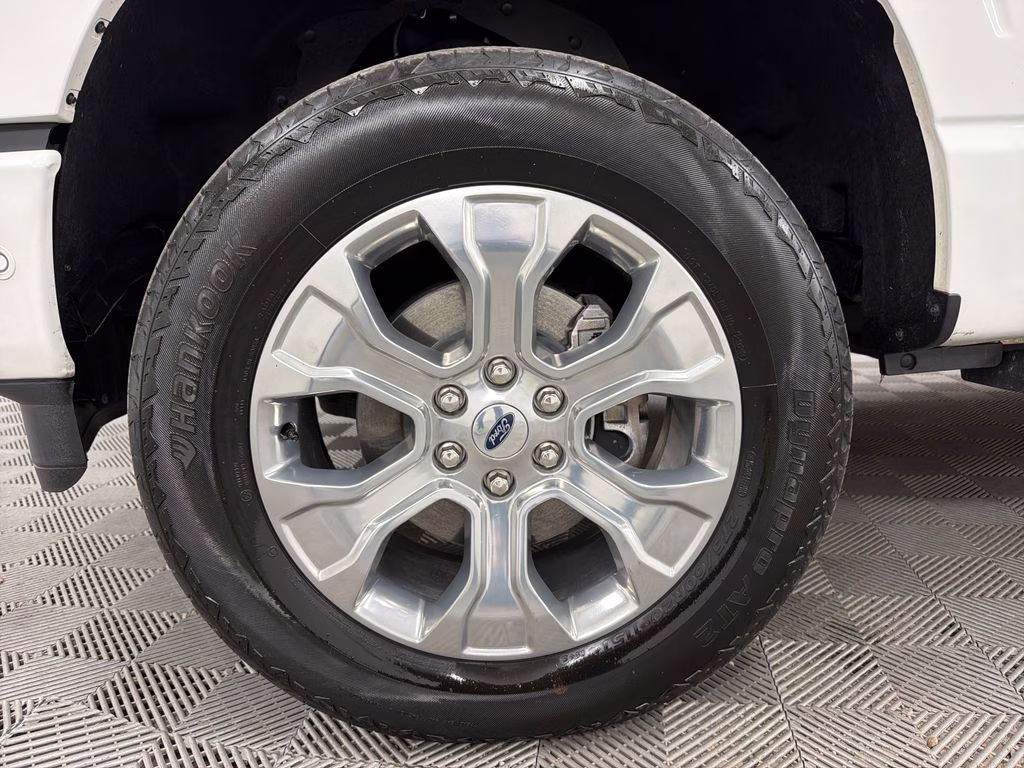 2023 Star White Metallic Tri-Coat Ford F-150 Platinum 4X4 Truck