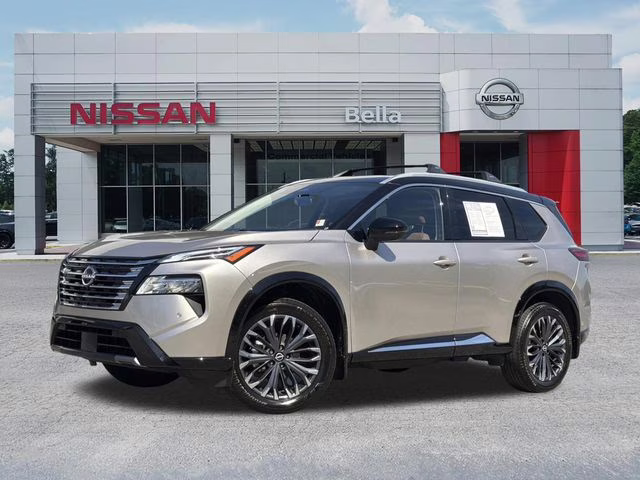 2025 Champagne Silver Metallic/Super Black Nissan Rogue Platinum FWD SUV