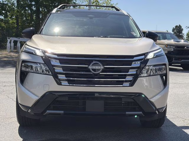 2025 Champagne Silver Metallic/Super Black Nissan Rogue Platinum FWD SUV
