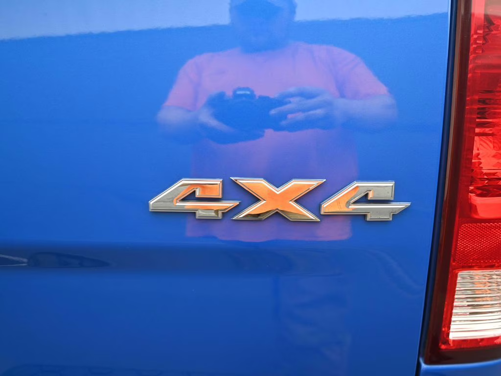 2024 Hydro Blue Pearlcoat Ram 1500 Classic SLT 4X4 Truck