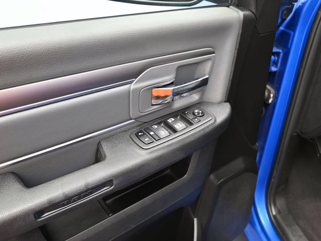 2024 Hydro Blue Pearlcoat Ram 1500 Classic SLT 4X4 Truck