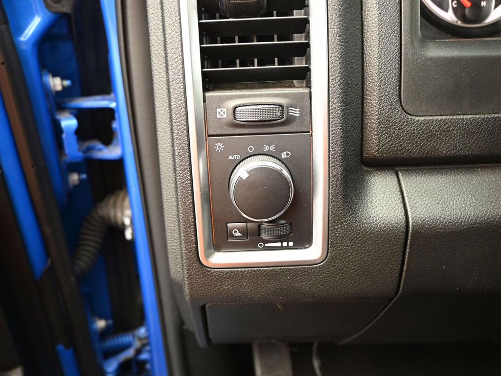 2024 Hydro Blue Pearlcoat Ram 1500 Classic SLT 4X4 Truck