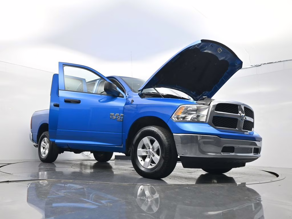 2024 Hydro Blue Pearlcoat Ram 1500 Classic SLT 4X4 Truck