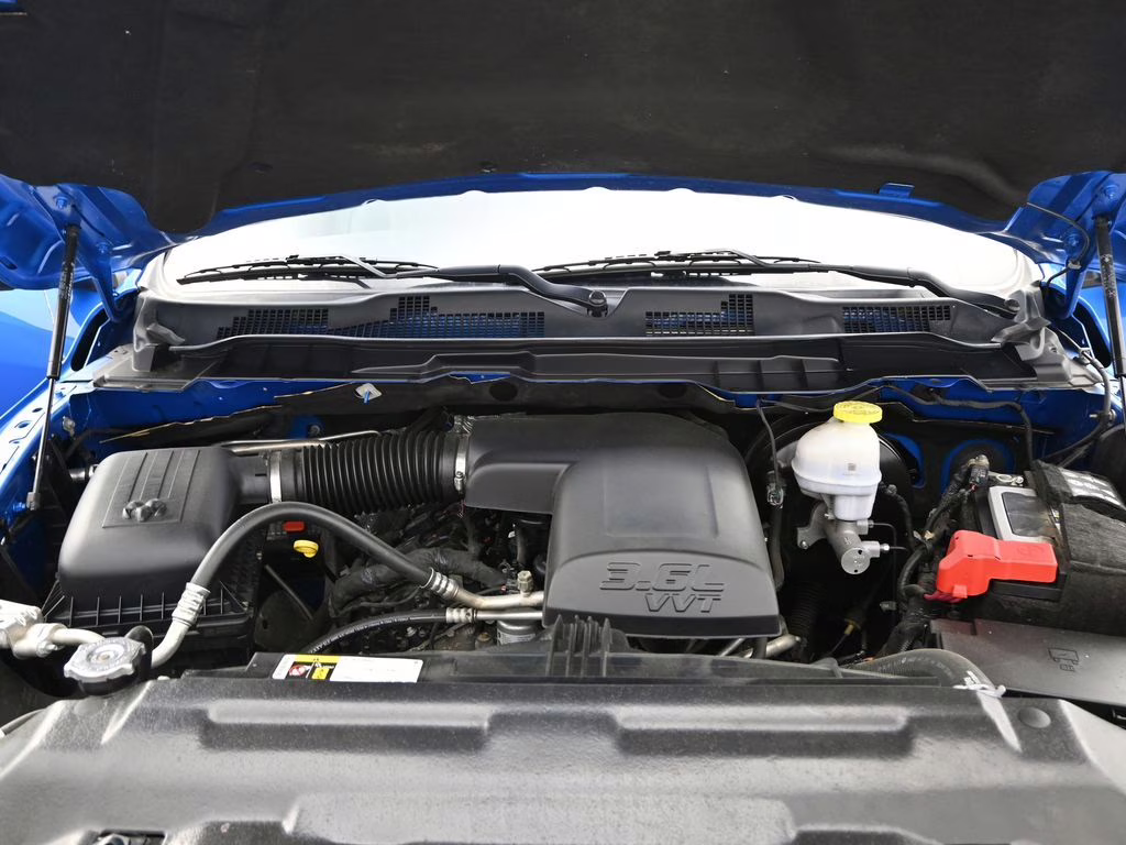 2024 Hydro Blue Pearlcoat Ram 1500 Classic SLT 4X4 Truck