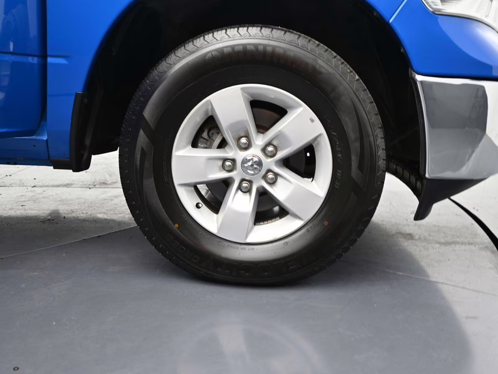 2024 Hydro Blue Pearlcoat Ram 1500 Classic SLT 4X4 Truck