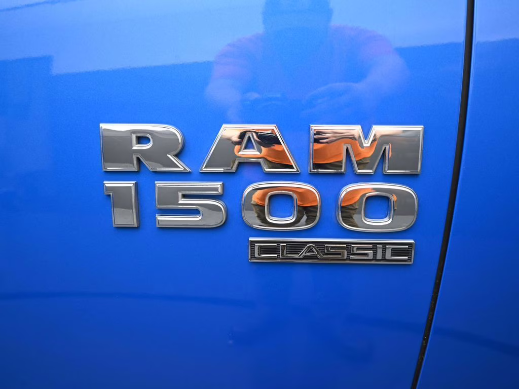2024 Hydro Blue Pearlcoat Ram 1500 Classic SLT 4X4 Truck